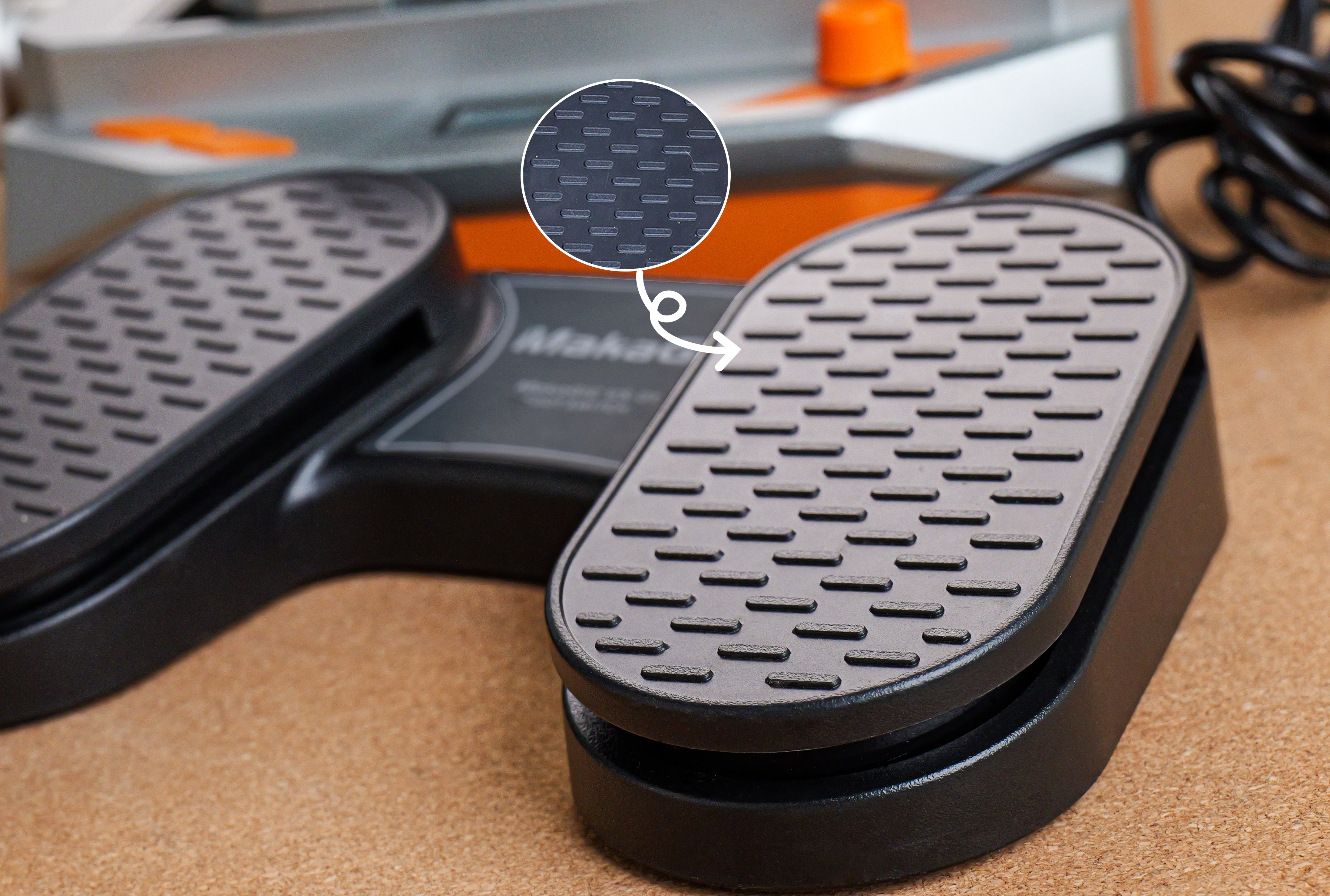 makagic vs01 smart vise and foot switch with black and metallic design.
